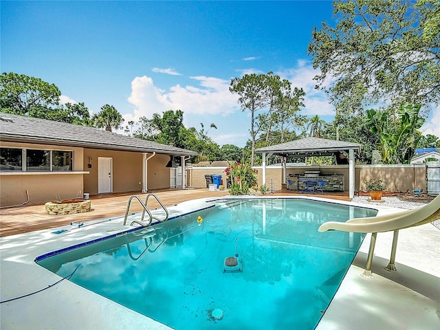4002 Hudson Ter, Tampa, FL 33618 - view of pool with a gazebo, a water slide, and a patio