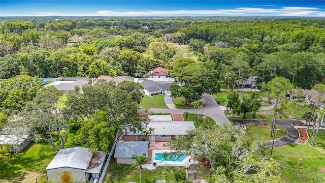 4002 Hudson Ter, Tampa, FL 33618 - aerial view of property and surrounding area featuring a forest and nearby suburban area