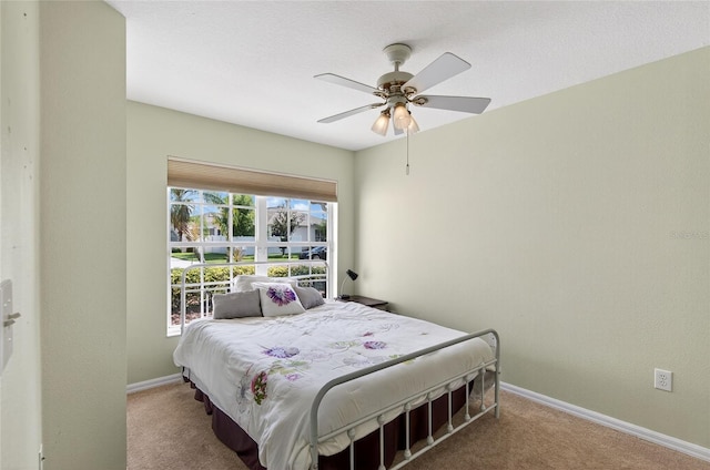 1822 Sassafras Dr, Wesley Chapel, FL 33543 - carpeted bedroom featuring baseboards and ceiling fan
