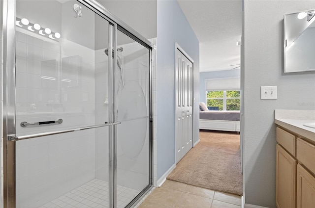 1822 Sassafras Dr, Wesley Chapel, FL 33543 - ensuite bathroom with vanity, a shower stall, and tile patterned flooring