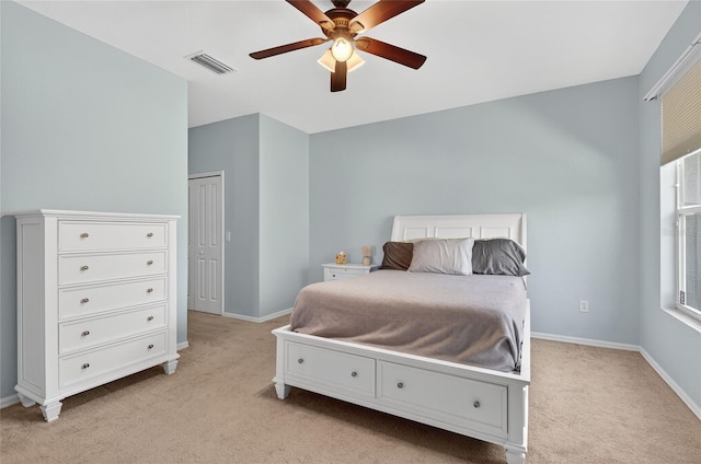 1822 Sassafras Dr, Wesley Chapel, FL 33543 - bedroom with light carpet and ceiling fan
