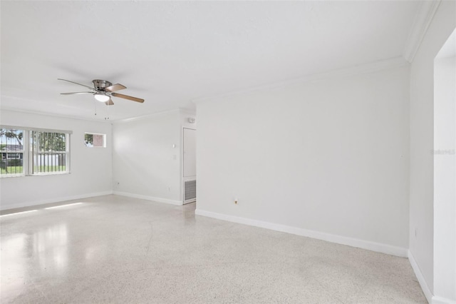 6220 Murdock Ave, Sarasota, FL 34231 - empty room with ornamental molding, a ceiling fan, and dark speckled floor