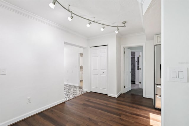 6220 Murdock Ave, Sarasota, FL 34231 - spare room featuring dark wood-style flooring and crown molding