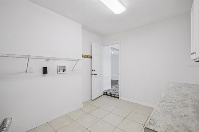 6220 Murdock Ave, Sarasota, FL 34231 - laundry area with hookup for a washing machine and light tile patterned floors