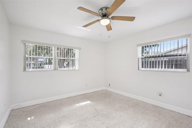 6220 Murdock Ave, Sarasota, FL 34231 - spare room with baseboards and ceiling fan