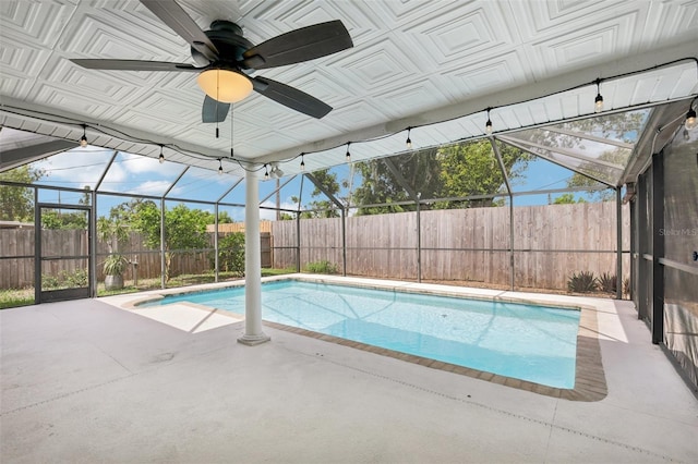 6220 Murdock Ave, Sarasota, FL 34231 - view of pool featuring a patio, a fenced backyard, glass enclosure, and a ceiling fan