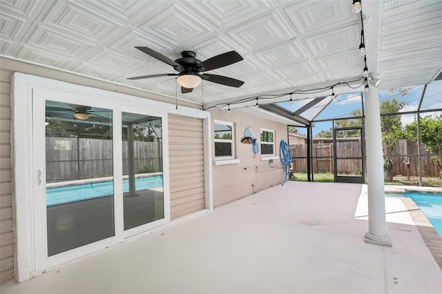 6220 Murdock Ave, Sarasota, FL 34231 - view of swimming pool with ceiling fan, a patio, a lanai, and a fenced backyard