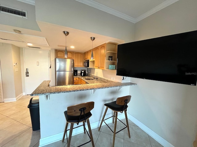 880 Mandalay Ave Unit C412, Clearwater Beach, FL 33767 - kitchen featuring stainless steel appliances, light tile patterned floors, ornamental molding, a peninsula, and open shelves