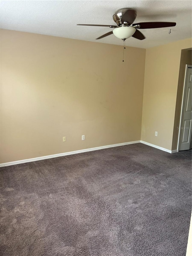 6252 Olivedale Dr, Riverview, FL 33578 - unfurnished room with a ceiling fan, dark colored carpet, and a textured ceiling