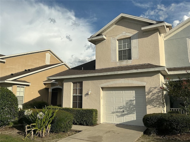 6252 Olivedale Dr, Riverview, FL 33578 - doorway to property featuring an attached garage and stucco siding