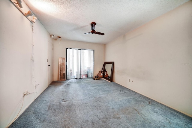 2817 Rustic Oaks Dr, Palm Harbor, FL 34684 - carpeted spare room featuring ceiling fan and a textured ceiling