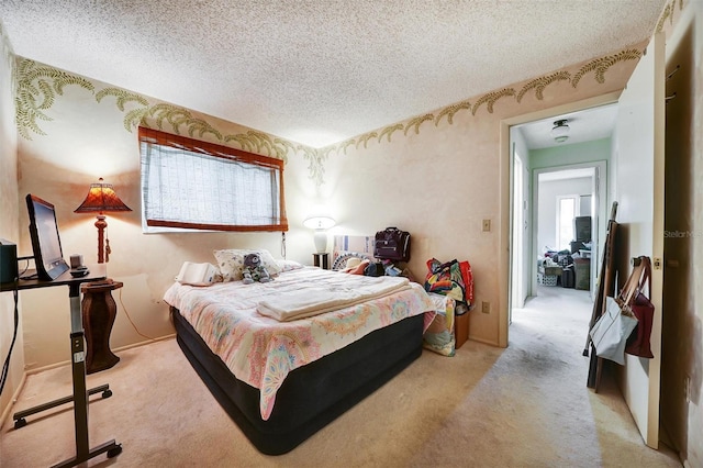 2817 Rustic Oaks Dr, Palm Harbor, FL 34684 - carpeted bedroom with a textured ceiling