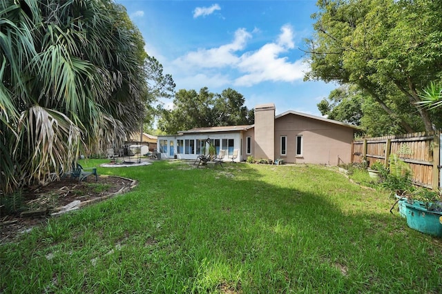 2817 Rustic Oaks Dr, Palm Harbor, FL 34684 - back of house with stucco siding and a patio area