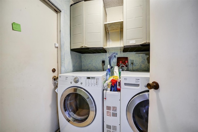 2817 Rustic Oaks Dr, Palm Harbor, FL 34684 - laundry room featuring washing machine and clothes dryer and cabinet space