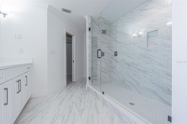5950 Bikini Way N, St Pete Beach, FL 33706 - full bath with a shower stall, vanity, crown molding, marble finish flooring, and a walk in closet