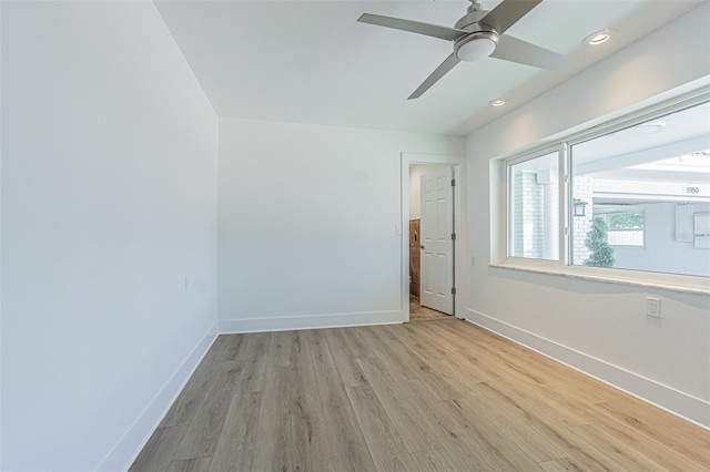 5950 Bikini Way N, St Pete Beach, FL 33706 - unfurnished room with light wood finished floors, a ceiling fan, and recessed lighting