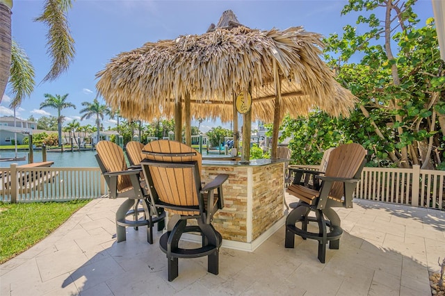5950 Bikini Way N, St Pete Beach, FL 33706 - view of patio featuring a water view