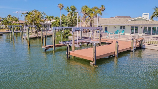 5950 Bikini Way N, St Pete Beach, FL 33706 - dock area featuring boat lift and a water view