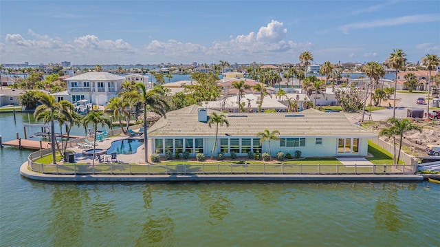 5950 Bikini Way N, St Pete Beach, FL 33706 - aerial view of residential area featuring a nearby body of water