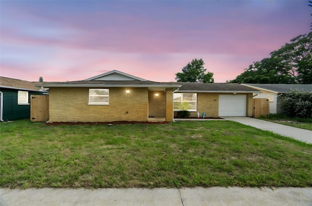 6715 Ranchwood Loop, New Port Richey, FL 34653 - ranch-style house featuring driveway, a garage, and brick siding