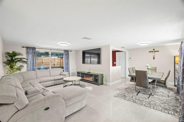 6715 Ranchwood Loop, New Port Richey, FL 34653 - living area with baseboards