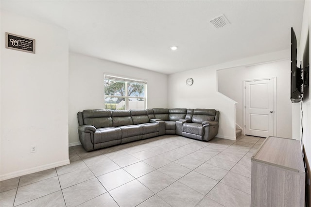 33657 Field Maple Loop, Wesley Chapel, FL 33545 - living room featuring light tile patterned flooring and baseboards