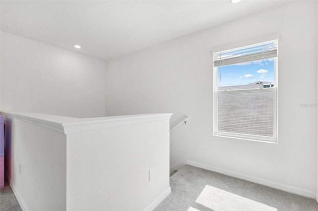 33657 Field Maple Loop, Wesley Chapel, FL 33545 - hallway with carpet, an upstairs landing, and recessed lighting