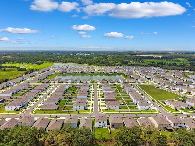 33657 Field Maple Loop, Wesley Chapel, FL 33545 - aerial perspective of suburban area featuring a nearby body of water