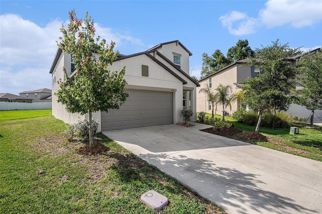 6347 Ten Acre Ct, Zephyrhills, FL 33541 - traditional home featuring a front lawn, driveway, stucco siding, and a garage