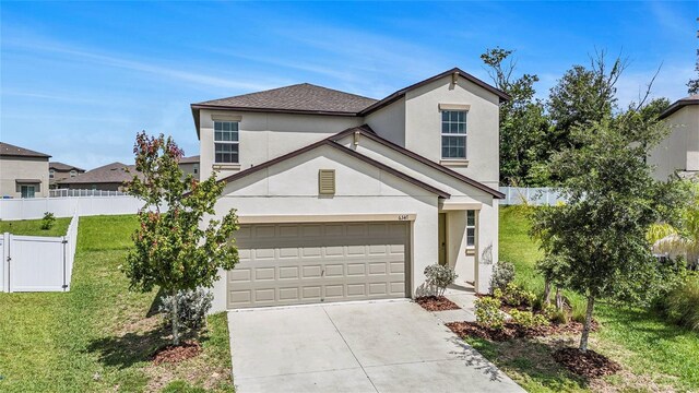6347 Ten Acre Ct, Zephyrhills, FL 33541 - traditional-style home with stucco siding, concrete driveway, and a garage