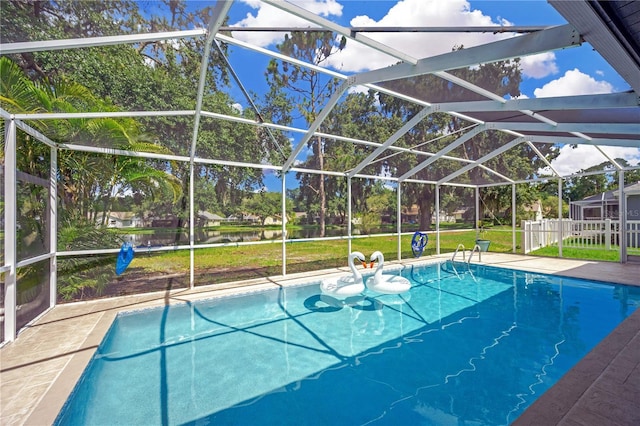 4617 Basswood St, Land O Lakes, FL 34639 - outdoor pool featuring glass enclosure