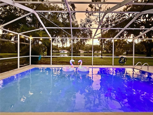 4617 Basswood St, Land O Lakes, FL 34639 - swimming pool with a lanai and a patio area