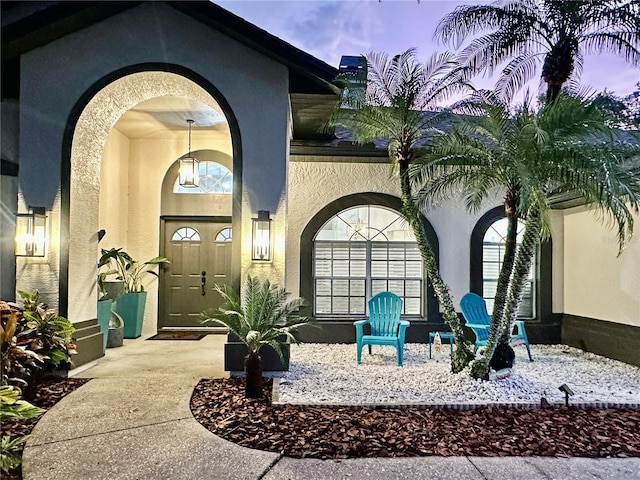 4617 Basswood St, Land O Lakes, FL 34639 - view of exterior entry featuring stucco siding