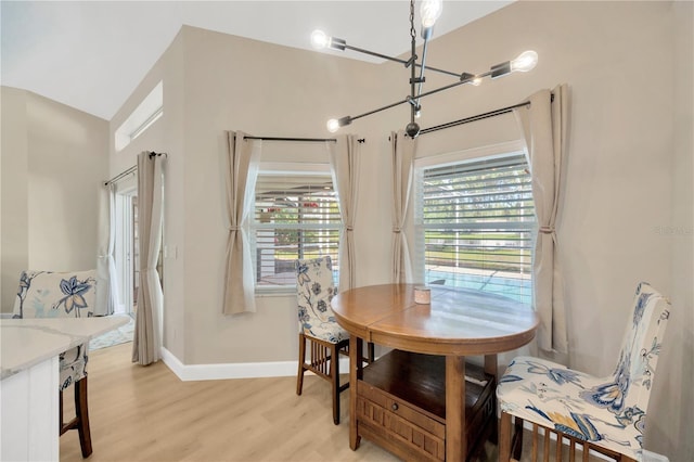 4617 Basswood St, Land O Lakes, FL 34639 - dining area with baseboards and light wood-style floors