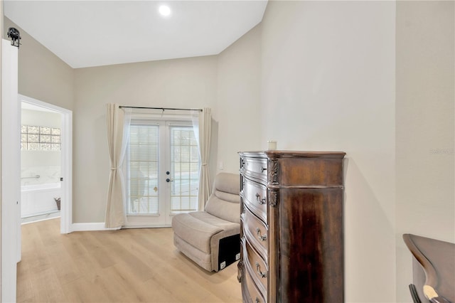 4617 Basswood St, Land O Lakes, FL 34639 - sitting room featuring light wood-type flooring and lofted ceiling