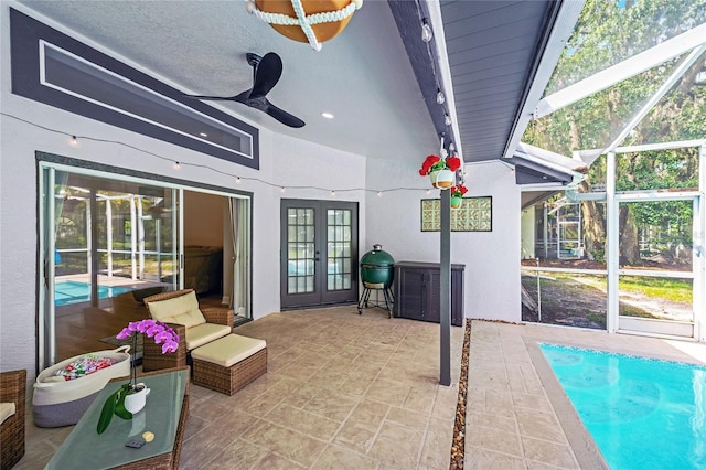 4617 Basswood St, Land O Lakes, FL 34639 - view of patio with french doors, glass enclosure, ceiling fan, and an outdoor pool