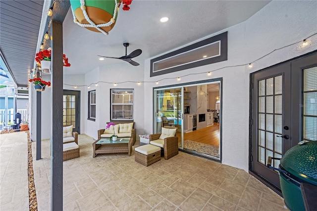 4617 Basswood St, Land O Lakes, FL 34639 - view of patio featuring french doors, a ceiling fan, and outdoor lounge area