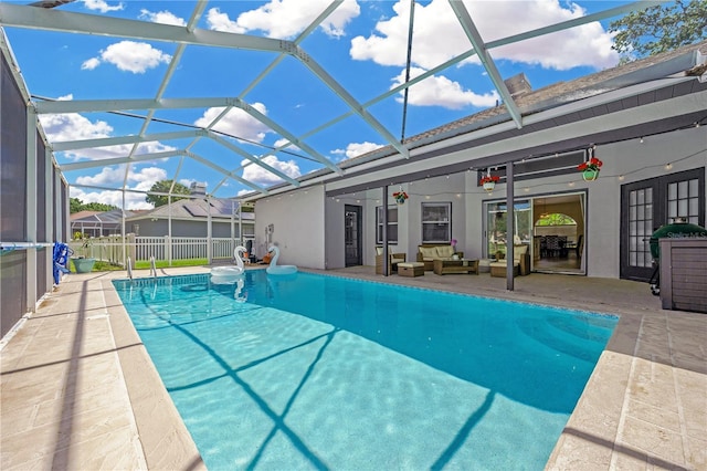 4617 Basswood St, Land O Lakes, FL 34639 - view of pool featuring outdoor lounge area, ceiling fan, a patio area, and glass enclosure
