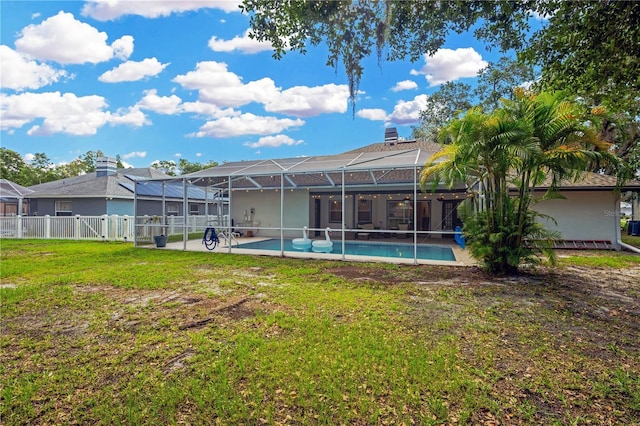 4617 Basswood St, Land O Lakes, FL 34639 - rear view of house featuring an outdoor pool, a patio area, and a lanai