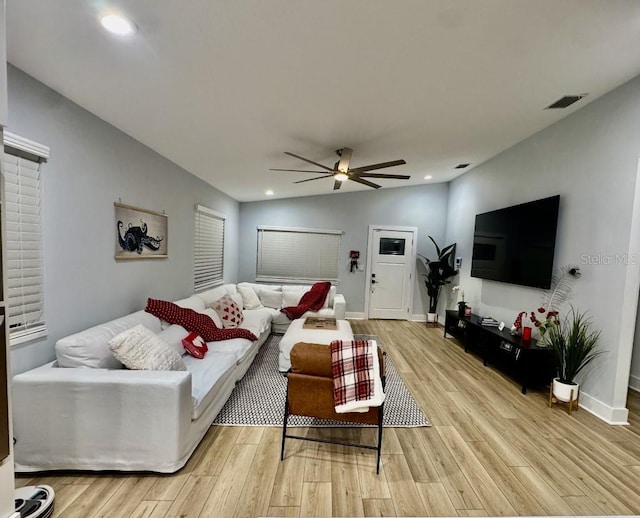 4029 9th Ave S, Saint Petersburg, FL 33711 - living room with light wood finished floors, a ceiling fan, recessed lighting, and vaulted ceiling