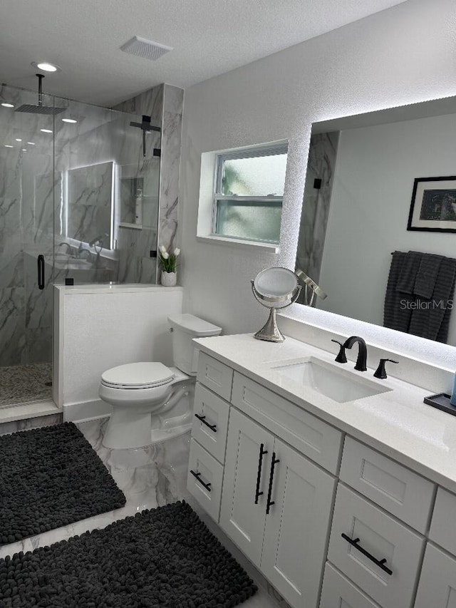 4029 9th Ave S, Saint Petersburg, FL 33711 - bathroom featuring vanity, a marble finish shower, marble look tiles, and a textured ceiling