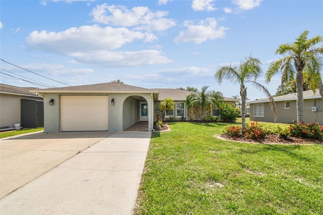 13909 Berkowitz Ave, Hudson, FL 34667 - ranch-style house featuring a garage, stucco siding, concrete driveway, and a front lawn
