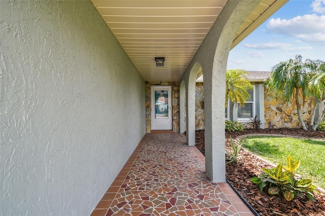13909 Berkowitz Ave, Hudson, FL 34667 - property entrance with stucco siding
