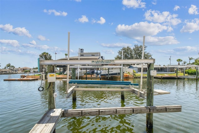 13909 Berkowitz Ave, Hudson, FL 34667 - dock area featuring boat lift and a water view