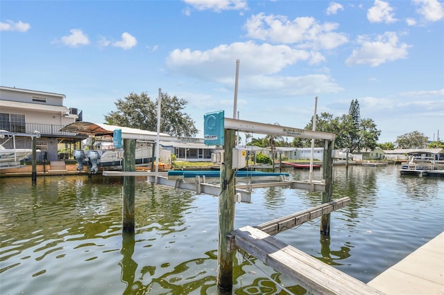 13909 Berkowitz Ave, Hudson, FL 34667 - dock area featuring boat lift and a water view