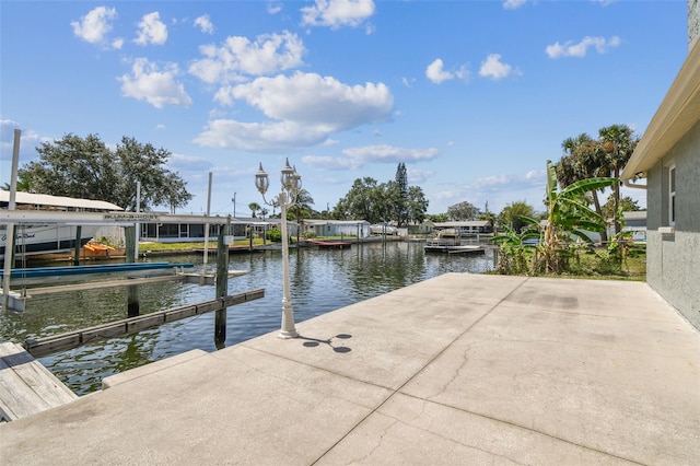13909 Berkowitz Ave, Hudson, FL 34667 - dock area featuring a water view and boat lift