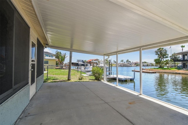 13909 Berkowitz Ave, Hudson, FL 34667 - view of patio featuring a water view and a dock