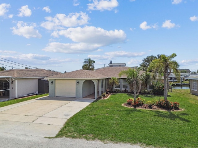 13909 Berkowitz Ave, Hudson, FL 34667 - single story home with driveway, a garage, a front yard, and stucco siding