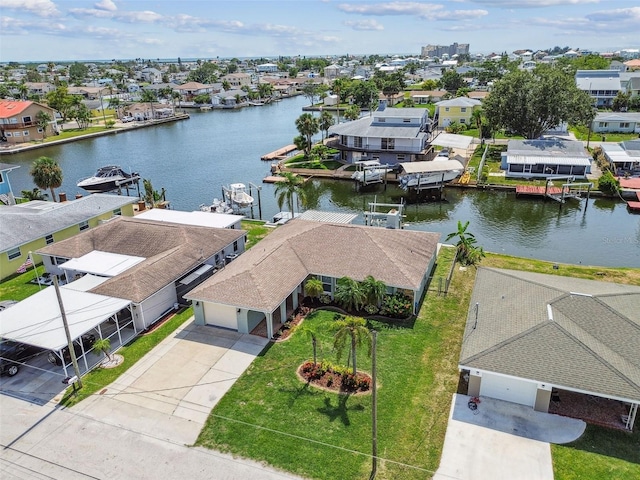 13909 Berkowitz Ave, Hudson, FL 34667 - aerial perspective of suburban area with a nearby body of water