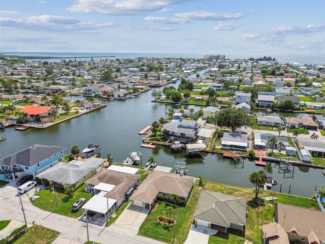 13909 Berkowitz Ave, Hudson, FL 34667 - aerial perspective of suburban area featuring a nearby body of water